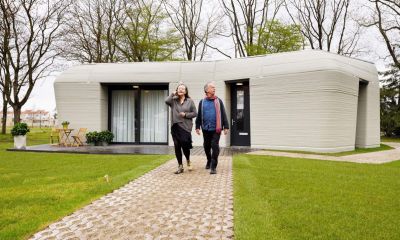 First resident of 3D-printed concrete house in Eindhoven receives key